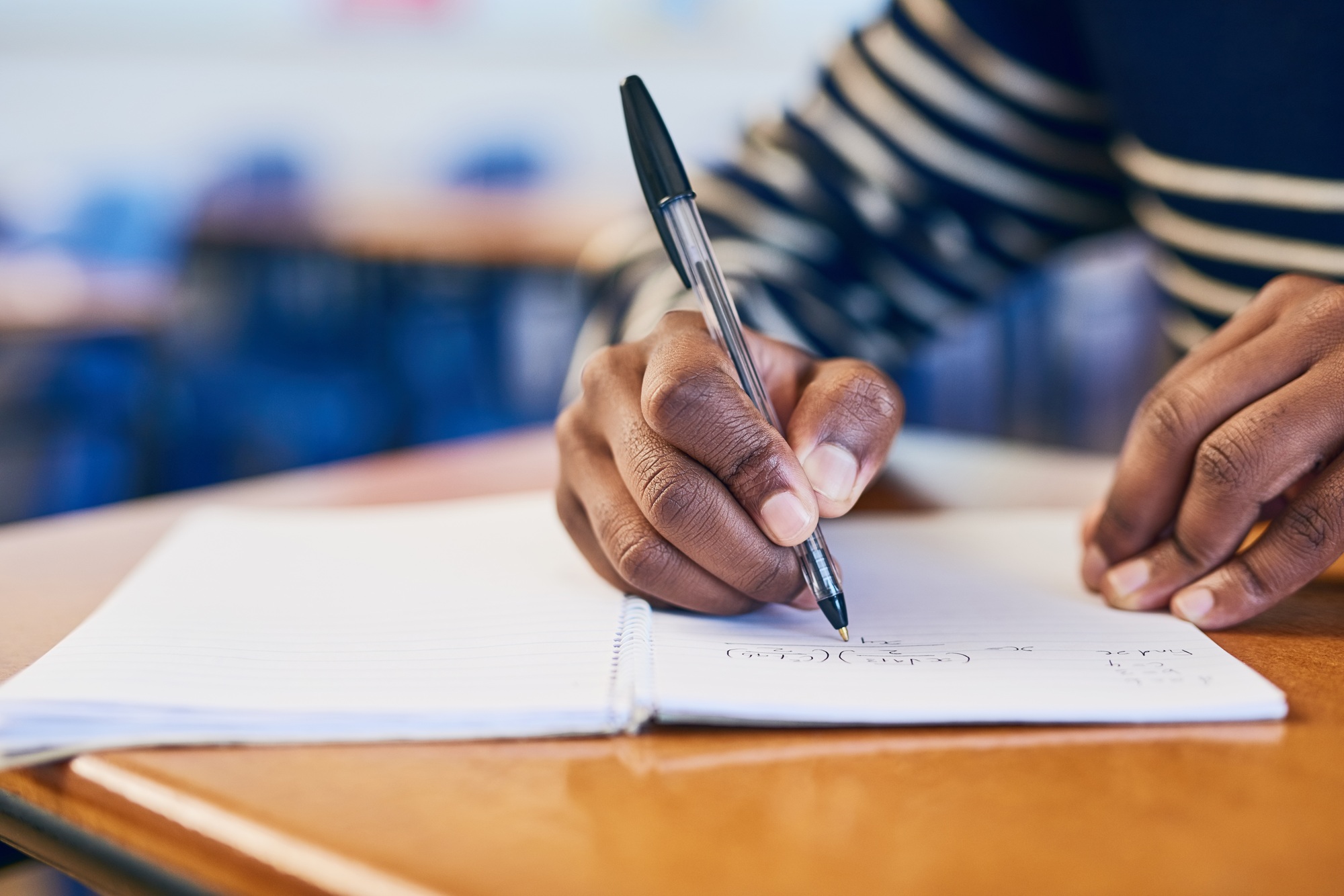 Maths is my favorite subject. Cropped shot of a university student writing in her notebook.