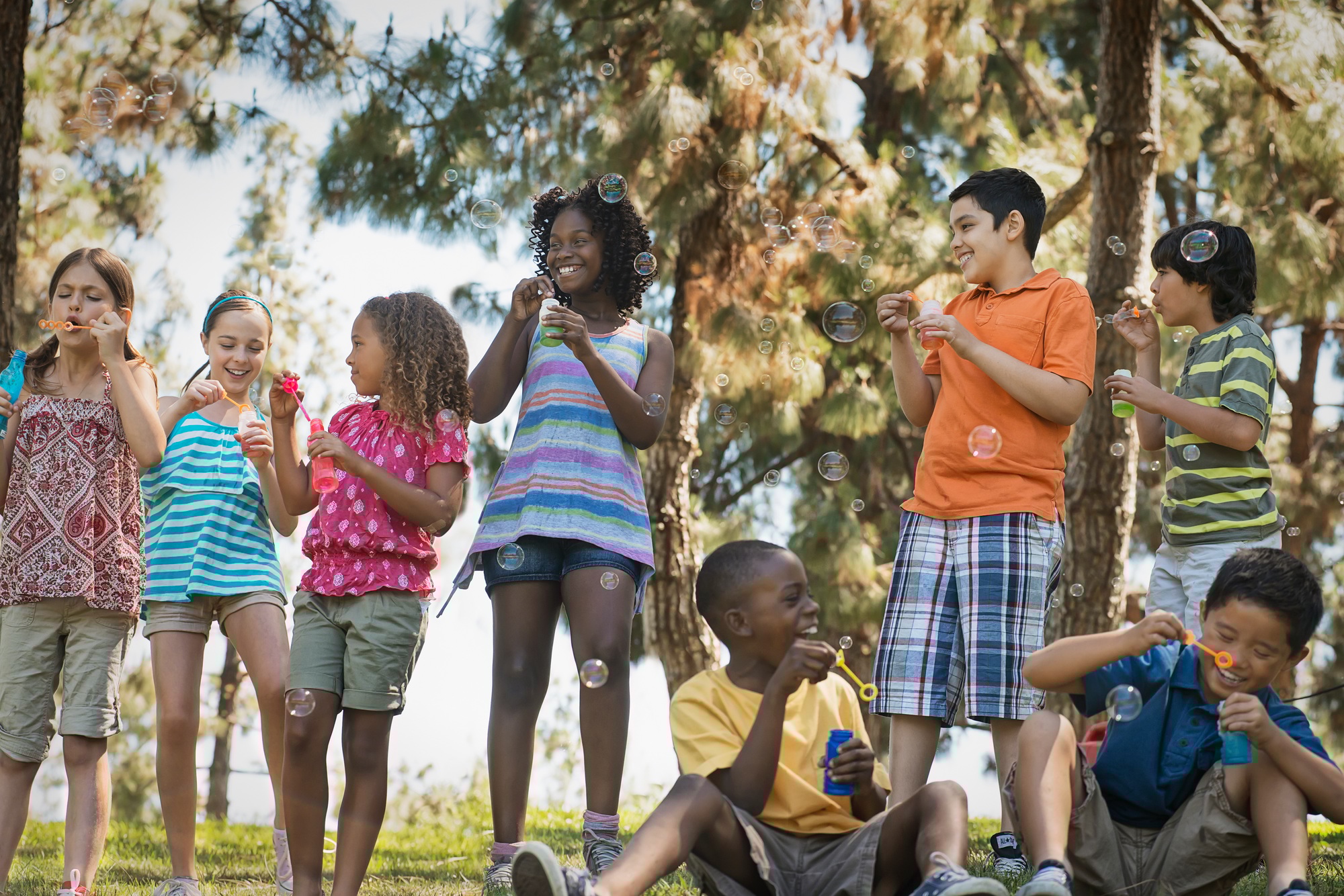 Children playing outdoors in summer